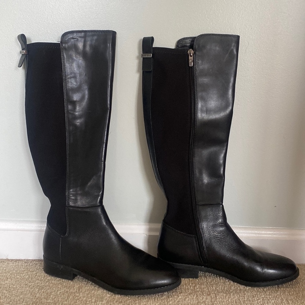 Marc Fisher boots.  Leather front/stretch back with side zip Never worn. Size 8.